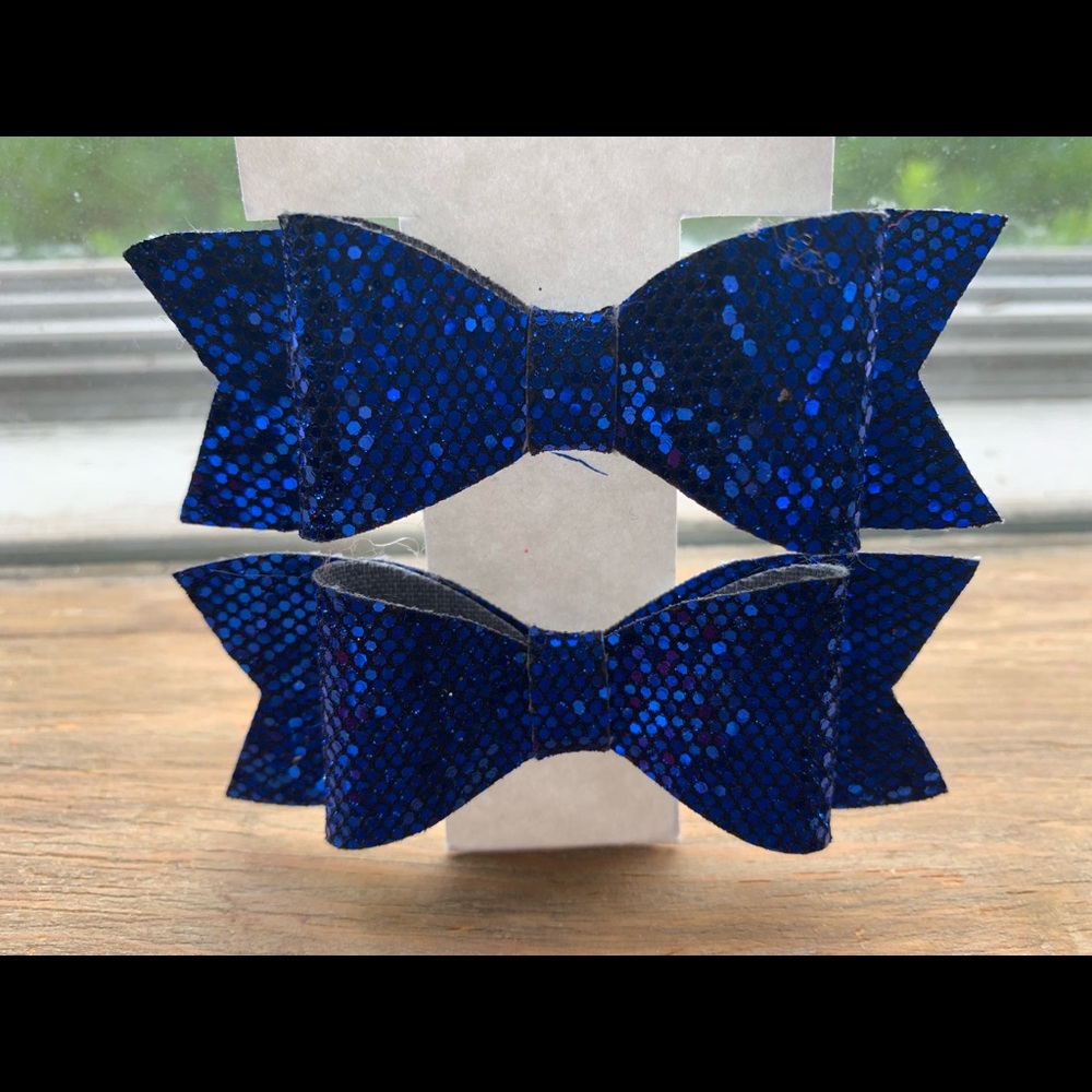Pair of blue hair bows